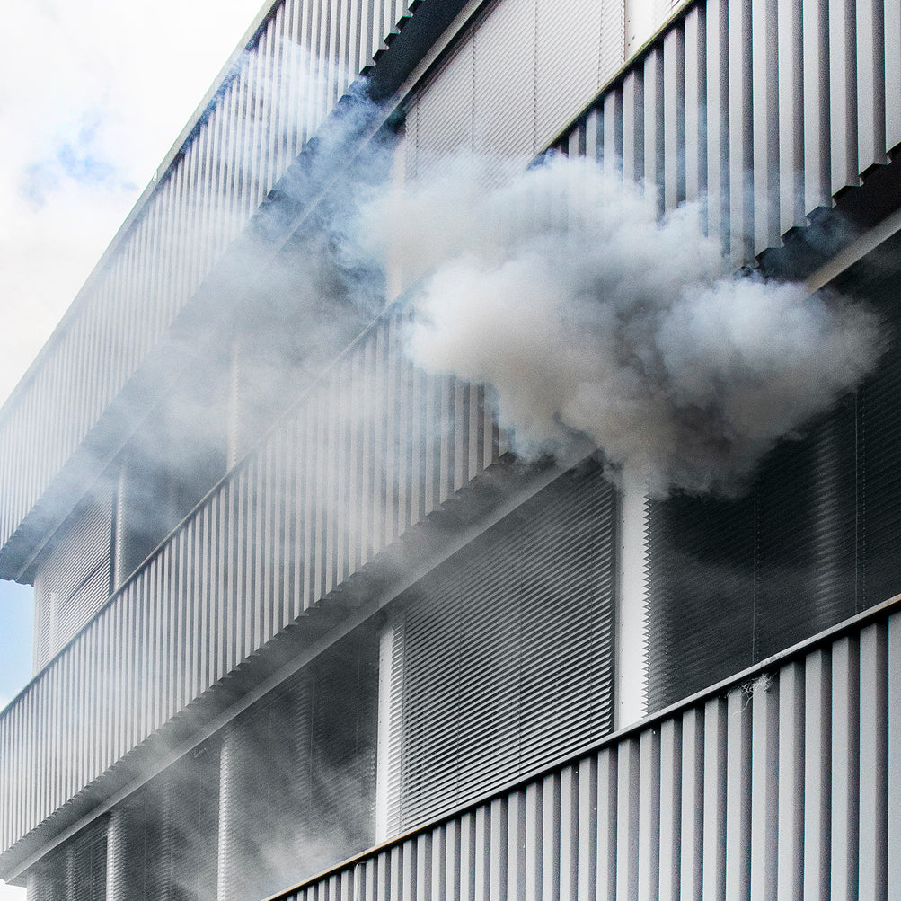 AISCO Smoke-y generates realistic smoke that exits a building's windows